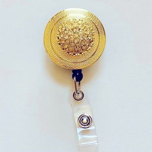 Retractable badge holder